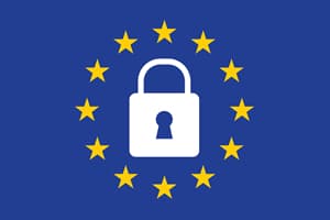 GDPR Compliance. A White lock in the center of the EU flag